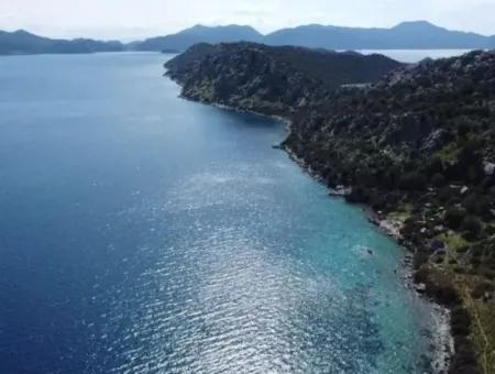 Grundstück Mit Meerblick Zum Verkauf Im Dorf Söğüt Im Bezirk Marmaris, Geeignet Für Investitionen 50 Meter Vom Meer Entfernt