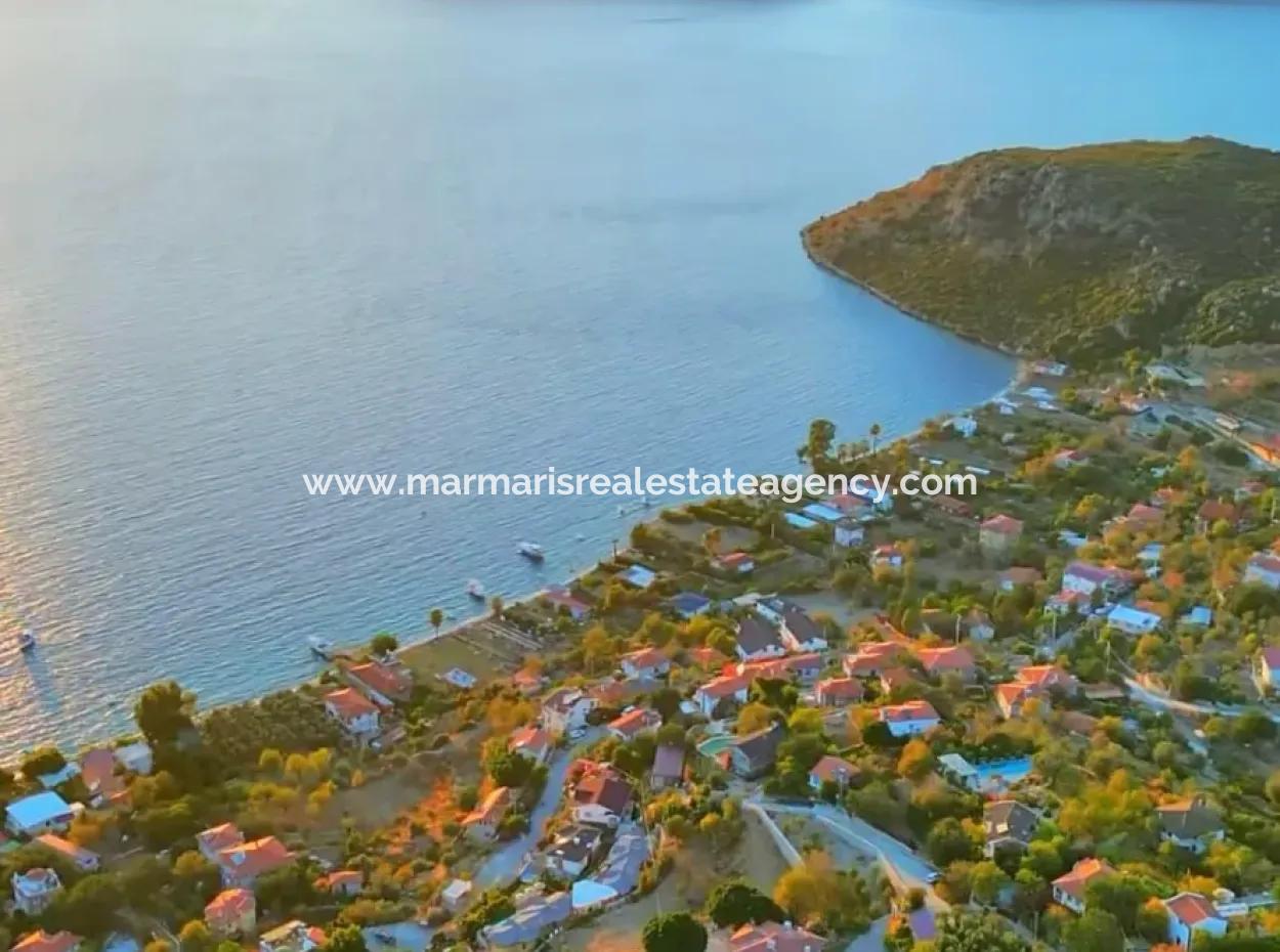 Detached House For Sale On 2000M2 Plot Of Land By The Sea In Marmaris Söğüt Neighborhood. Suitable For Tying A Boat In Front Of It.