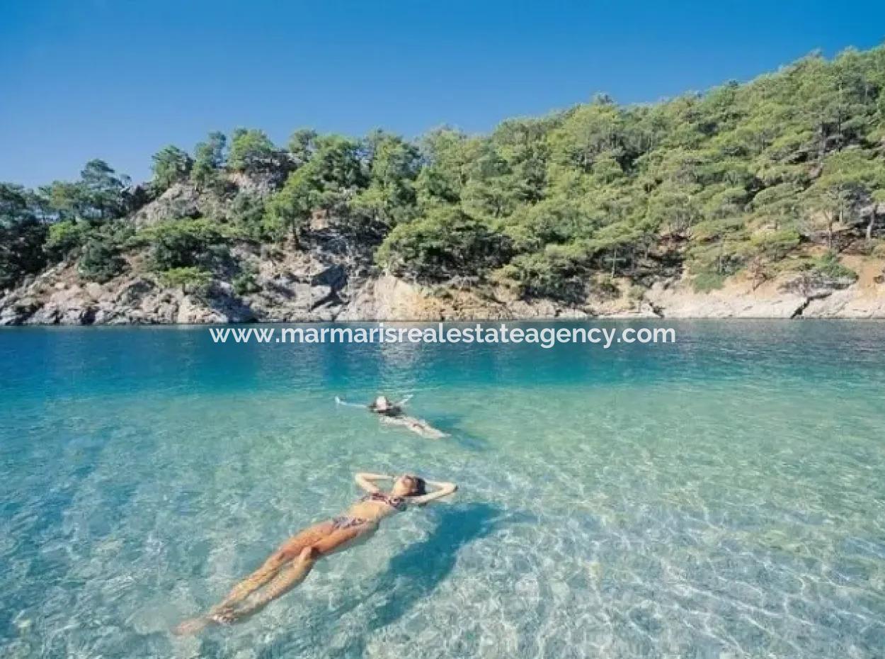 Marmaris,Den 18 Km Uzaklıkta 19000M2 Denize Sıfır Otel Arsamız Satılıktır.