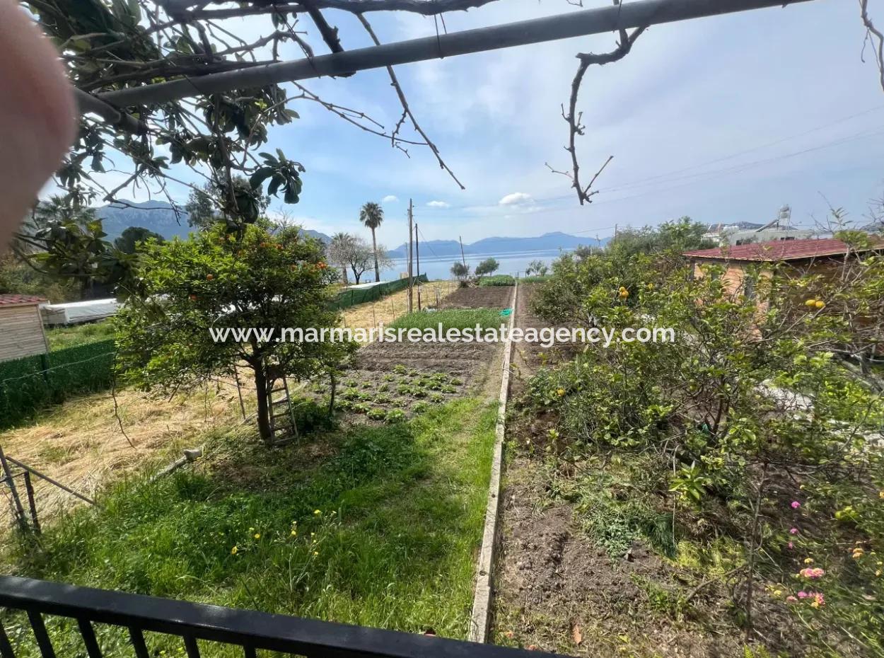 Marmaris Söğüt Mahallesi Denize Sıfır 2000M2 Arsa Satılık Müstakil Ev.önüne Tekne Bağlamaya Uygun.