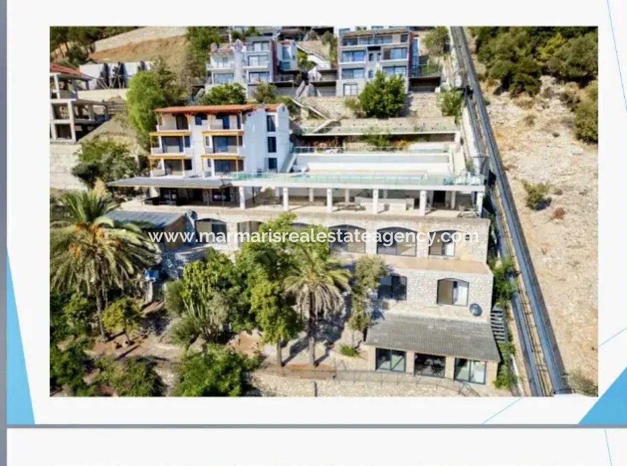 Emlakçıdan Marmaris Turunç Koyunda Deniz Manzaralı Satılık Butik Otel  Odalı