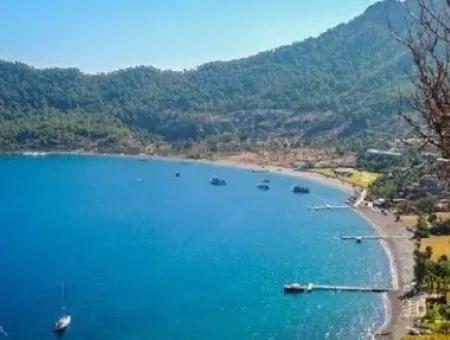 Marmaris,Den 18 Km Uzaklıkta 19000M2 Denize Sıfır Otel Arsamız Satılıktır.