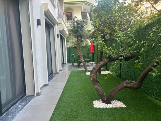 Marmaris Çıldır’da Denize 30 M Sıfır Lüks Bahçeli Eşyalı Kiralık 2+1